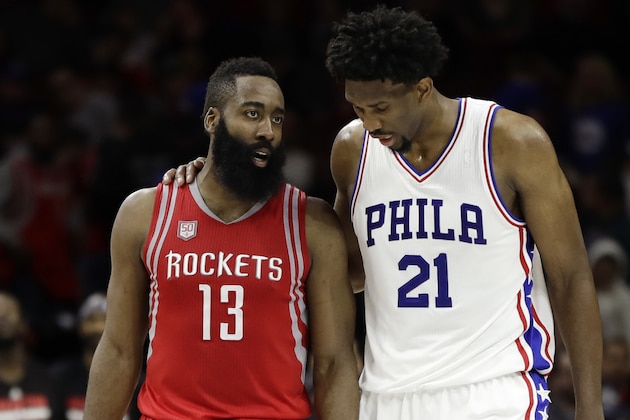 Houston Rockets' James Harden, left, and Philadelphia 76ers' Joel Embiid talk during the final minute of an NBA basketball game, Friday, Jan. 27, 2017, in Philadelphia. Houston won 123-118. (AP Photo/Matt Slocum)