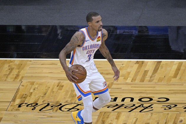 Oklahoma City Thunder guard George Hill (3) sets up a play during the first half of an NBA basketball game against the Orlando Magic, Saturday, Jan. 2, 2021, in Orlando, Fla. (AP Photo/Phelan M. Ebenhack)