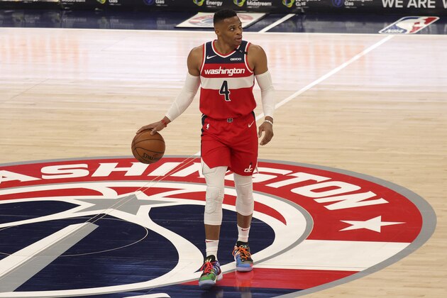 Washington Wizards' Russell Westbrook brings the ball up against the Chicago Bulls during the first half of an NBA basketball game Thursday, Dec. 31, 2020, in Washington. (Rob Carr/Pool Photo via AP)