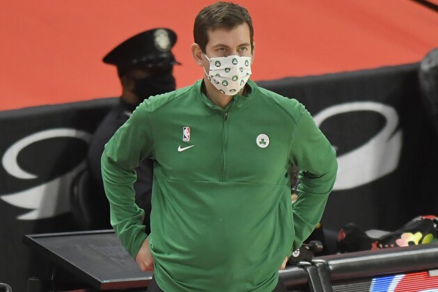 Boston Celtics head coach Brad Stevens watches his team play against the Detroit Pistons during the second half of an NBA basketball game Sunday, Jan. 3, 2021, in Detroit. The Celtics defeated the Pistons 122-120. (AP Photo/Jose Juarez)