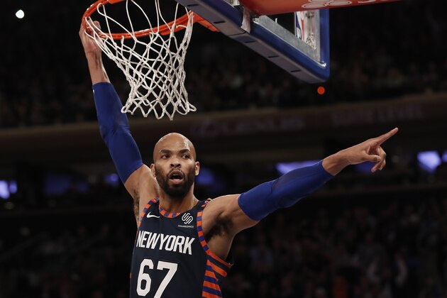 New York Knicks center Taj Gibson react after a slam dunk against the Orlando Magic during the second half of an NBA basketball game Thursday, Feb. 6, 2020, in New York. (AP Photo/Michael Owens)