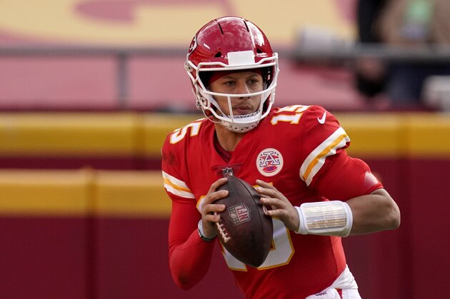 Kansas City Chiefs quarterback Patrick Mahomes looks to pass during the second half of an NFL football game against the Atlanta Falcons Sunday, Dec. 27, 2020, in Kansas City, Mo. (AP Photo/Charlie Riedel)