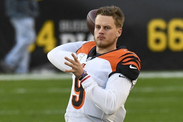 Cincinnati Bengals quarterback Joe Burrow (9) warms up before an NFL football game against the Pittsburgh Steelers in Pittsburgh, Sunday, Nov. 15, 2020. (AP Photo/Don Wright)
