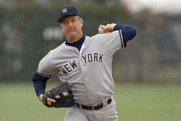 New York Yankees 45-year-old veteran left-hander Tommy John reaches back with his