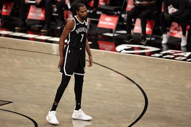 Brooklyn Nets forward Kevin Durant (7) reacts during an NBA basketball game against the Atlanta Hawks, Friday, Jan. 1, 2021, in New York. The Hawks won 114-96. (AP Photo/Adam Hunger)