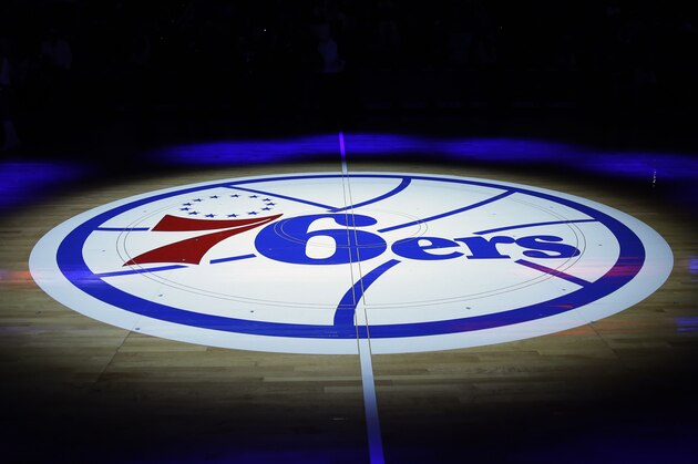 The Philadelphia 76ers' lhalf-court logo is shown before an NBA basketball game against the Cleveland Cavaliers, Friday, Nov. 8, 2013, in Philadelphia. (AP Photo/Matt Slocum)