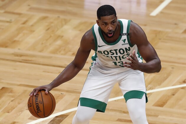 Boston Celtics' Tristan Thompson plays against the Brooklyn Nets during the first half of an NBA basketball game, Friday, Dec. 25, 2020, in Boston. (AP Photo/Michael Dwyer)