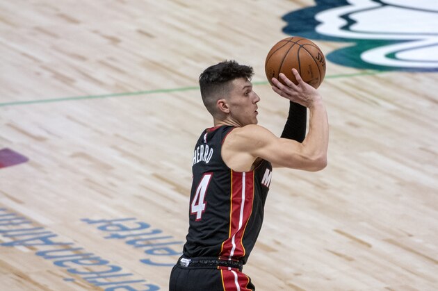 Miami Heat guard Tyler Herro (14) shoots during an NBA basketball game against the Dallas Mavericks, Friday, Jan. 1, 2021, in Dallas. Dallas won 93-83. (AP Photo/Jeffrey McWhorter)