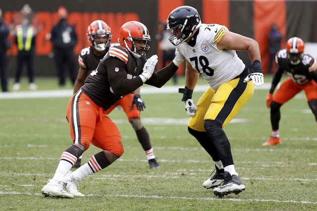 Cleveland Browns defensive end Myles Garrett (95) attempts to run past Pittsburgh Steelers offensive tackle Alejandro Villanueva (78) during an NFL football game on Sunday, Jan. 3, 2021, in Cleveland. Cleveland defeated Pittsburgh 24-22. (AP Photo/Kirk Irwin)