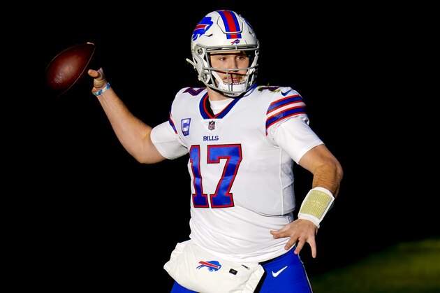 Buffalo Bills quarterback Josh Allen (17) runs against the Denver Broncos during an NFL football game, Saturday, Dec. 19, 2020, in Denver. (AP Photo/Jack Dempsey)