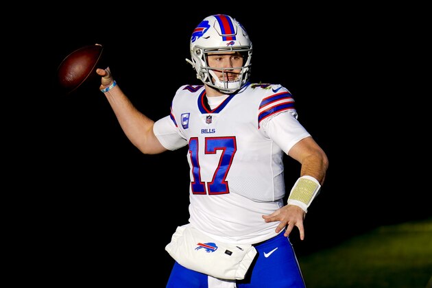 Buffalo Bills quarterback Josh Allen (17) runs against the Denver Broncos during an NFL football game, Saturday, Dec. 19, 2020, in Denver. (AP Photo/Jack Dempsey)