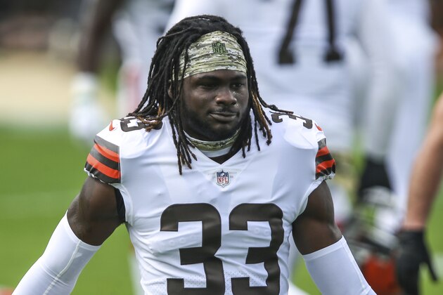 Cleveland Browns safety Ronnie Harrison Jr. (33) wears a Salute to Service headband during warm-ups before an NFL football game against the Jacksonville Jaguars, Sunday, Nov. 29, 2020, in Jacksonville, Fla. (AP Photo/Gary McCullough)