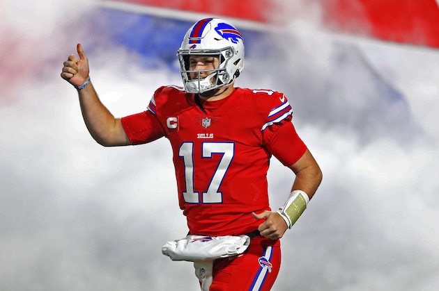 Buffalo Bills quarterback Josh Allen (17) runs onto the field for the first half of an NFL football game against the Pittsburgh Steelers in Orchard Park, N.Y., Sunday, Dec. 13, 2020. The Bills won 26-15. (AP Photo/Jeffrey T. Barnes )