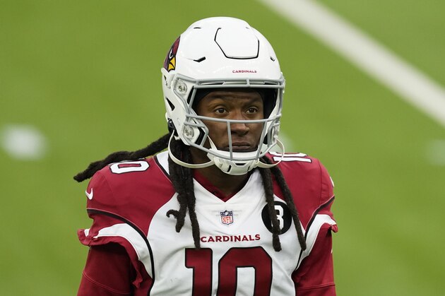 Arizona Cardinals wide receiver DeAndre Hopkins (10) walks off the field while warming up before an NFL football game against the Los Angeles Rams Sunday, Jan. 3, 2021, in Inglewood, Calif. (AP Photo/Ashley Landis)