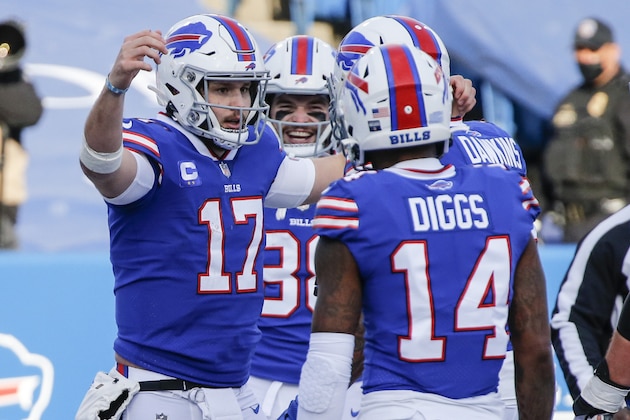 Buffalo Bills' Josh Allen (17) celebrates with teammate Stefon Diggs (14) after scoring a touchdown during the first half of an NFL wild-card playoff football game against the Indianapolis Colts Saturday, Jan. 9, 2021, in Orchard Park, N.Y. (AP Photo/Jeffrey T. Barnes)