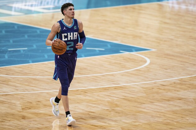 Charlotte Hornets guard LaMelo Ball (2) brings the ball up court against the Atlanta Hawks during an NBA basketball game in Charlotte, N.C., Saturday, Jan. 9, 2021. (AP Photo/Jacob Kupferman)