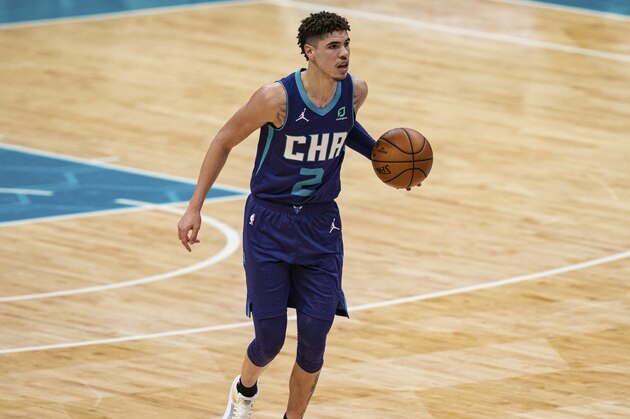 Charlotte Hornets guard LaMelo Ball (2) brings the ball up court against the Atlanta Hawks during an NBA basketball game in Charlotte, N.C., Saturday, Jan. 9, 2021. (AP Photo/Jacob Kupferman)