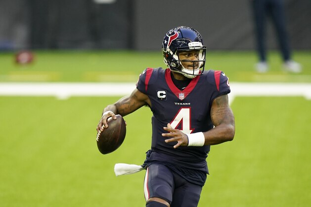 Houston Texans quarterback Deshaun Watson (4) rolls out as he looks to pass during an NFL football game against the Tennessee Titans, Sunday, Jan. 3, 2021, in Houston. (AP Photo/Matt Patterson)