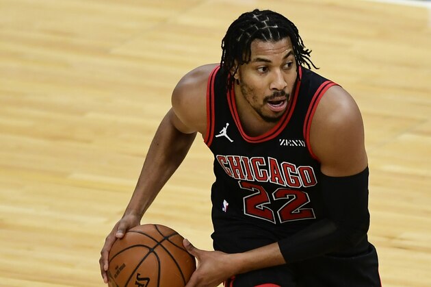 Chicago Bulls' Otto Porter Jr. looks to pass during the first half of an NBA basketball game against the Dallas Mavericks Sunday, Jan. 3, 2021, in Chicago. Chicago won 118-108. (AP Photo/Paul Beaty)