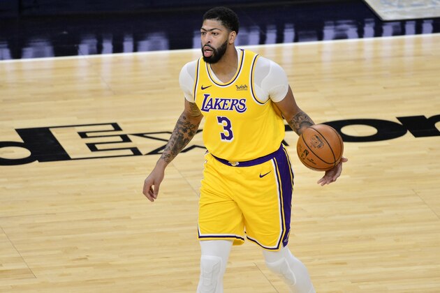 Los Angeles Lakers forward Anthony Davis (3) handles the ball in the first half of an NBA basketball game against the Memphis Grizzlies Tuesday, Jan. 5, 2021, in Memphis, Tenn. (AP Photo/Brandon Dill)