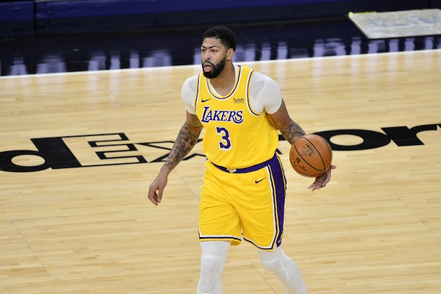 Los Angeles Lakers forward Anthony Davis (3) handles the ball in the first half of an NBA basketball game against the Memphis Grizzlies Tuesday, Jan. 5, 2021, in Memphis, Tenn. (AP Photo/Brandon Dill)