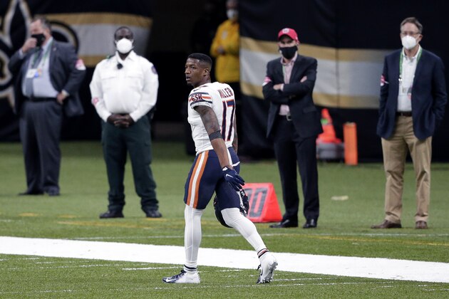 Chicago Bears wide receiver Anthony Miller (17) walks off the field after being ejected for unsportsmanlike conduct in the second half of an NFL wild-card playoff football game against the New Orleans Saints in New Orleans, Sunday, Jan. 10, 2021. (AP Photo/Butch Dill)