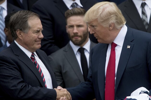 President Donald Trump shakes hands with New England Patriots head coach Bill Belichick during a ceremony on the South Lawn of the White House in Washington, Wednesday, April 19, 2017, where the president honored the Super Bowl Champion New England Patriots for their Super Bowl LI victory. Also pictured is New England Patriots wide receiver Julian Edelman, center. (AP Photo/Andrew Harnik)