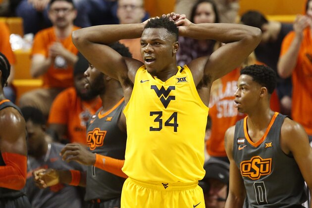 West Virginia forward Oscar Tshiebwe (34) reacts to a call in the first half of an NCAA college basketball game against Oklahoma State in Stillwater, Okla., Monday, Jan. 6, 2020. (AP Photo/Sue Ogrocki)