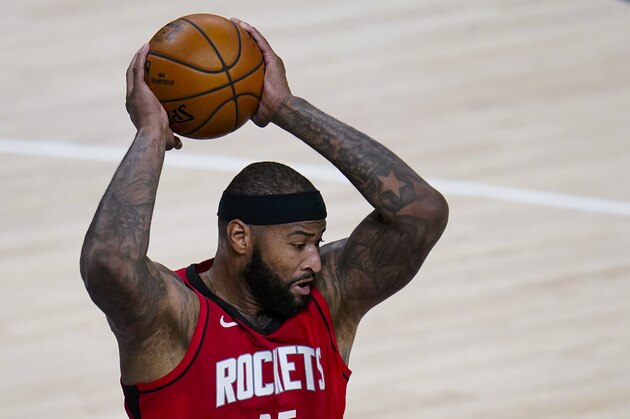Houston Rockets center DeMarcus Cousins (15) plays against the Indiana Pacers during the second quarter of an NBA basketball game in Indianapolis, Wednesday, Jan. 6, 2021. (AP Photo/Michael Conroy)