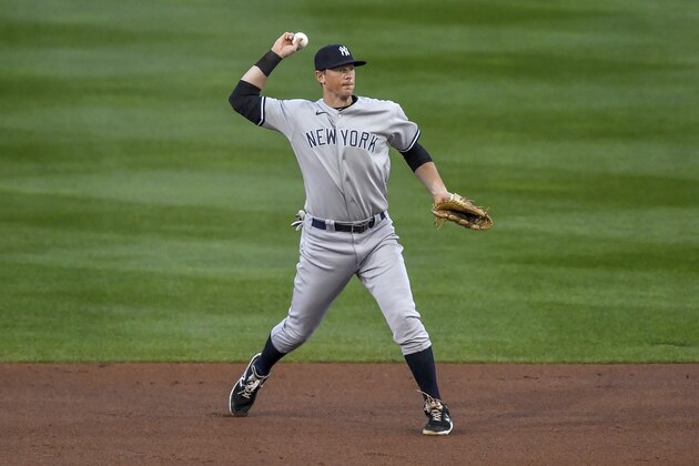 New York Yankees second baseman DJ LeMahieu fields a groundout by Toronto Blue Jays' Teoscar HernÃ¡ndez during the first inning of a baseball game in Buffalo, N.Y., Tuesday, Sept. 22, 2020. (AP Photo/Adrian Kraus)