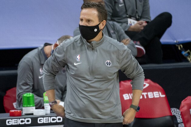 Washington Wizards head coach Scott Brooks looks on during the first half of an NBA basketball game against the Philadelphia 76ers, Wednesday, Jan. 6, 2021, in Philadelphia. The 76ers won 141-136. (AP Photo/Chris Szagola)