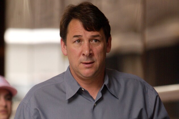 New York Islanders general manager Mike Milbury arrives at the Westin Hotel in New York  for a meeting between league owners and general managers, Wednesday, April 20, 2005 in New York. (AP Photo/Mary Altaffer)