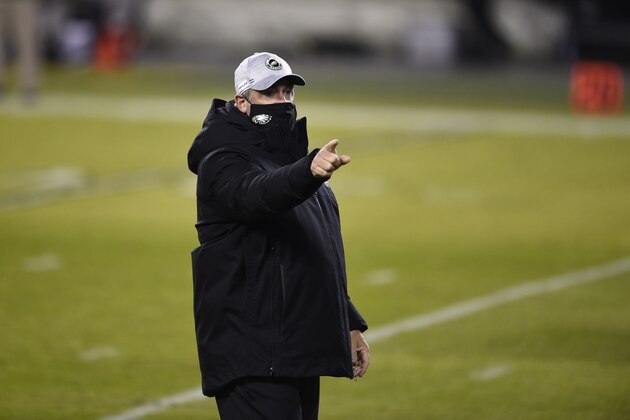 Philadelphia Eagles' Doug Pederson walks the field before an NFL football game against the Washington Football Team, Sunday, Jan. 3, 2021, in Philadelphia. (AP Photo/Derik Hamilton)