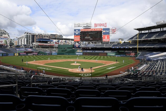 The Washington Nationals and the New York Mets compete during a baseball game at Nationals Park, Sunday, Sept. 27, 2020, in Washington. (AP Photo/Nick Wass)