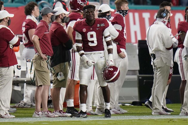 Alabama defensive back Jordan Battle reacts as he leaves the game after a targeting call against him during the first half of an NCAA College Football Playoff national championship game against Ohio State, Monday, Jan. 11, 2021, in Miami Gardens, Fla. (AP Photo/Chris O'Meara)