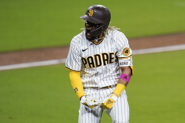 San Diego Padres' Fernando Tatis Jr. reacts after hitting a three-run home run during the sixth inning of Game 2 of the team's National League wild-card baseball series against the St. Louis Cardinals, Thursday, Oct. 1, 2020, in San Diego. (AP Photo/Gregory Bull)