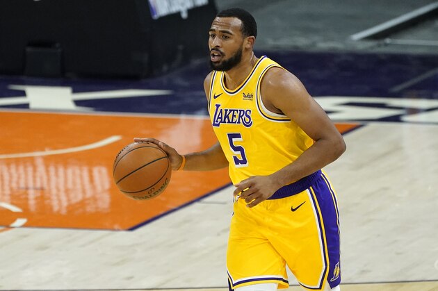 Los Angeles Lakers guard Talen Horton-Tucker (5) against the Phoenix Suns during the first half of a preseason basketball game, Friday, Dec. 18, 2020, in Phoenix, Ariz. (AP Photo/Matt York)