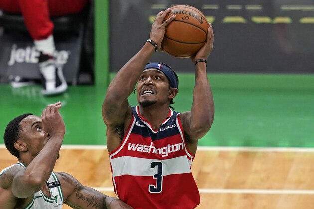 Washington Wizards guard Bradley Beal (3) shoots against Boston Celtics guard Jeff Teague in the first half of an NBA basketball game, Friday, Jan. 8, 2021, in Boston. (AP Photo/Elise Amendola)