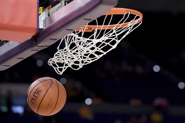 Basketball through the hoop in the first half of an NCAA college basketball game, Tuesday, Feb. 18, 2020, in Baton Rouge, La. (AP Photo/Bill Feig)