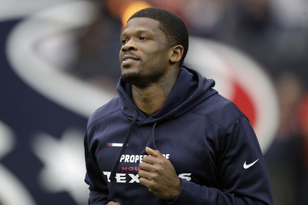Former Houston Texans receiver Andre Johnson, who is being inducted into the Texans Ring of Honor, runs on to the field before an NFL football game between the Houston Texans and the Arizona Cardinals, Sunday, Nov. 19, 2017, in Houston. (AP Photo/David J. Phillip)