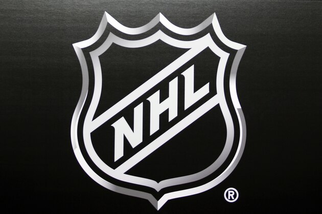 FILE - In this June 22, 2016, file photo, the NHL logo is shown during a press conference in Las Vegas. NHL free agency day began with two rivals helping each other out of a jam by way of a trade. The Toronto Maple Leafs acquired defenseman Cody Ceci, a 2020 third-round pick and minor leaguers Ben Harpur and Aaron Luchuk from the Ottawa Senators for defenseman Nikita Zaitsev, forward Connor Brown and minor leaguer Michael Carcone. The teams announced the trade early Monday, roughly 3½ hours before the start of free agency. (AP Photo/John Locher, File)
