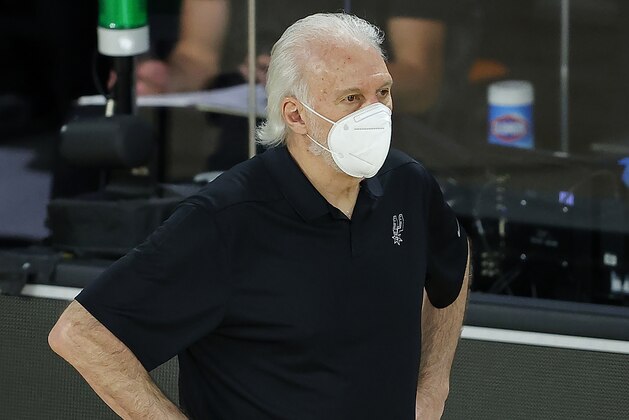 San Antonio Spurs head coach Gregg Popovich watches during the second half of an NBA basketball game against the Utah Jazz Friday, Aug. 7, 2020, in Lake Buena Vista, Fla. (Kevin C. Cox/Pool Photo via AP)