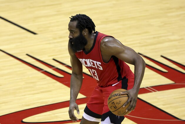 Houston Rockets' James Harden controls the ball during the third quarter of an NBA basketball game against the Los Angeles Lakers, Sunday, Jan. 10, 2021, in Houston. (Carmen Mandato/Pool Photo via AP)