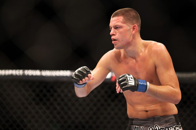 Nate Diaz is seen during his match against UFC lightweight champion Benson Henderson in their mixed martial arts bout at a UFC on FOX 5 event in Seattle, Saturday, Dec. 8, 2012. Henderson retained his title via unanimous 5-rd. decision. (AP Photo/Gregory Payan)