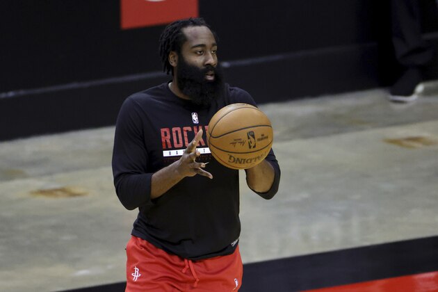 Houston Rockets' James Harden warms up prior to an NBA basketball game against the Los Angeles Lakers, Sunday, Jan. 10, 2021, in Houston. (Carmen Mandato/Pool Photo via AP)