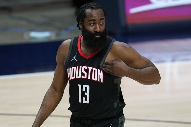 Houston Rockets guard James Harden (13) in the first half of an NBA basketball game Monday, Dec. 28, 2020, in Denver. (AP Photo/David Zalubowski)