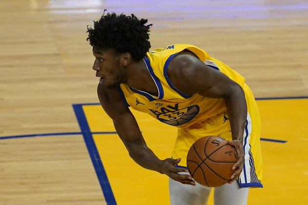 Golden State Warriors center James Wiseman (33) against the Sacramento Kings during an NBA basketball game in San Francisco, Monday, Jan. 4, 2021. (AP Photo/Jeff Chiu)