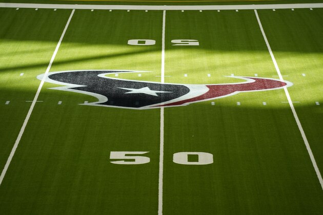 The Houston Texans logo can be seen a midfield at NRG Stadium before an NFL football game against the Indianapolis Colts, Sunday, Dec. 6, 2020, in Houston. (AP Photo/Matt Patterson)