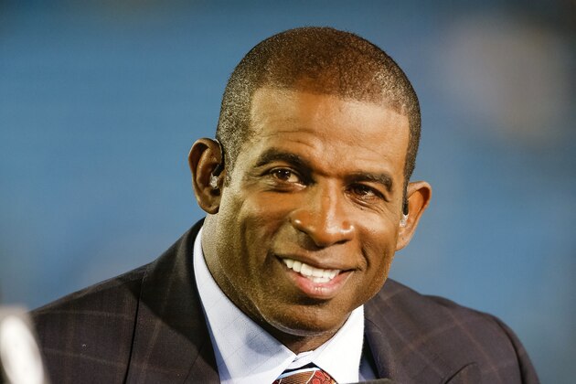 FILE - In this Oct. 12, 2017, file photo, Thursday Night Football analyst Deion Sanders gives his take before an NFL football game between the Philadelphia Eagles and Carolina Panthers in Charlotte, N.C. Hall of Fame cornerback Deion Sanders says he will become Jackson State's football coach. Sanders made the announcement Sunday night, Sept. 20, 2020, on the first episode of the “21st & Prime” podcast with Jamie Dukes on Barstool Sports. (AP Photo/Bob Leverone, File)