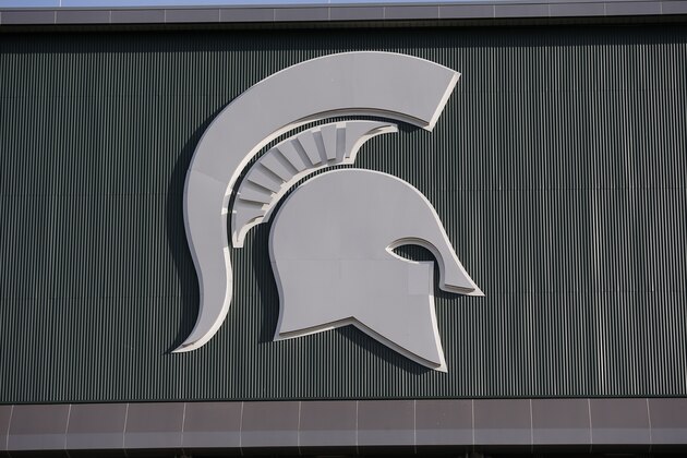 Michigan State's logo is seen on Spartan Stadium before the start of an NCAA college football game between Michigan State and Tulsa, Friday, Aug. 30, 2019, in East Lansing, Mich. (AP Photo/Al Goldis)